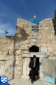 00000863-yeshiva-student-emerging-from-kever-rebbe-yehuda-hanasi.jpg